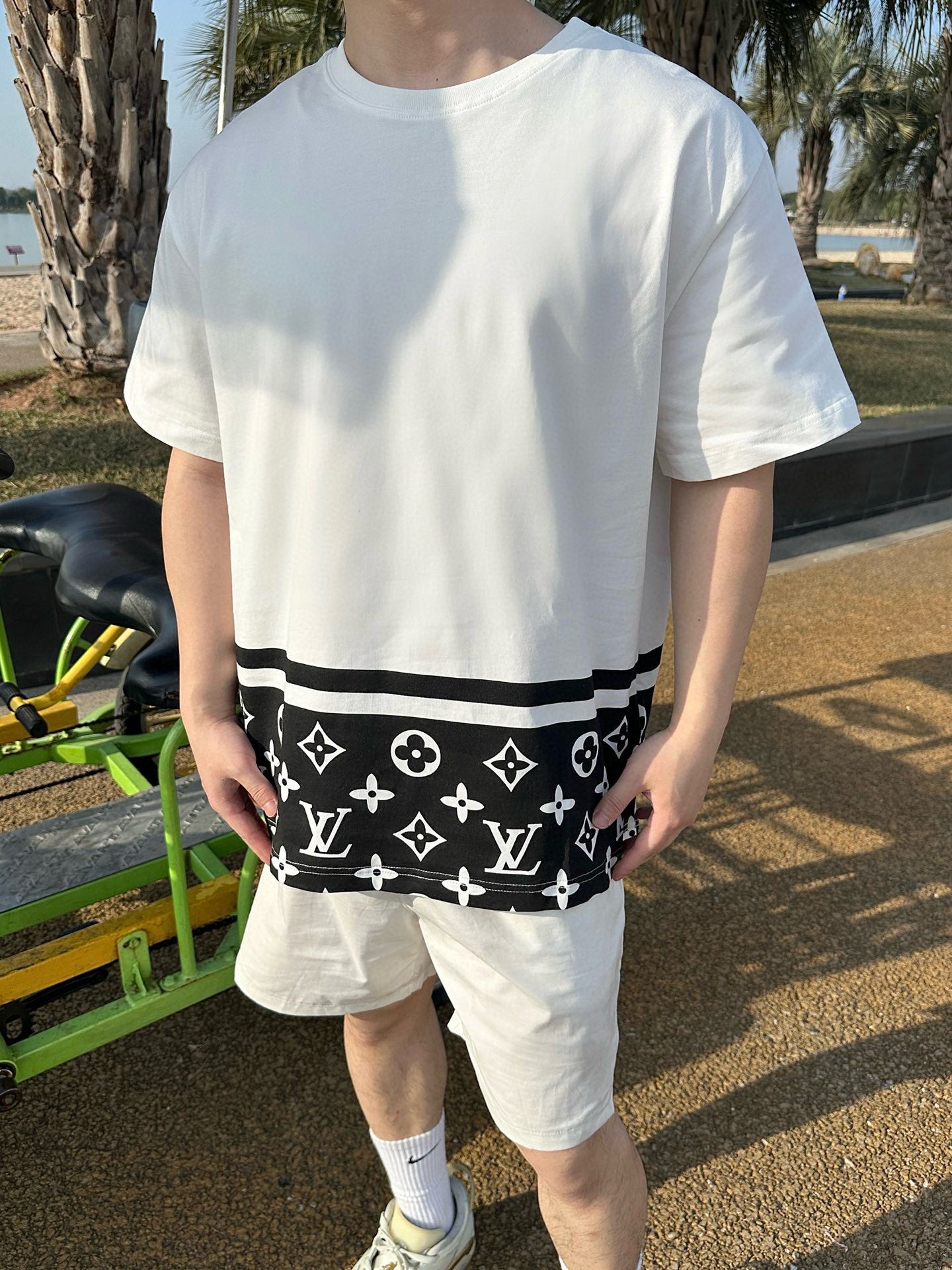25ss hemline with floral patchwork print short sleeved shirt