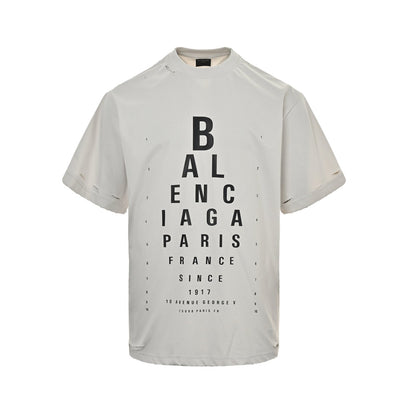 Eye chart knife cuts holes in short sleeves