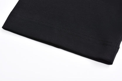 Short sleeves with small leather label on chest