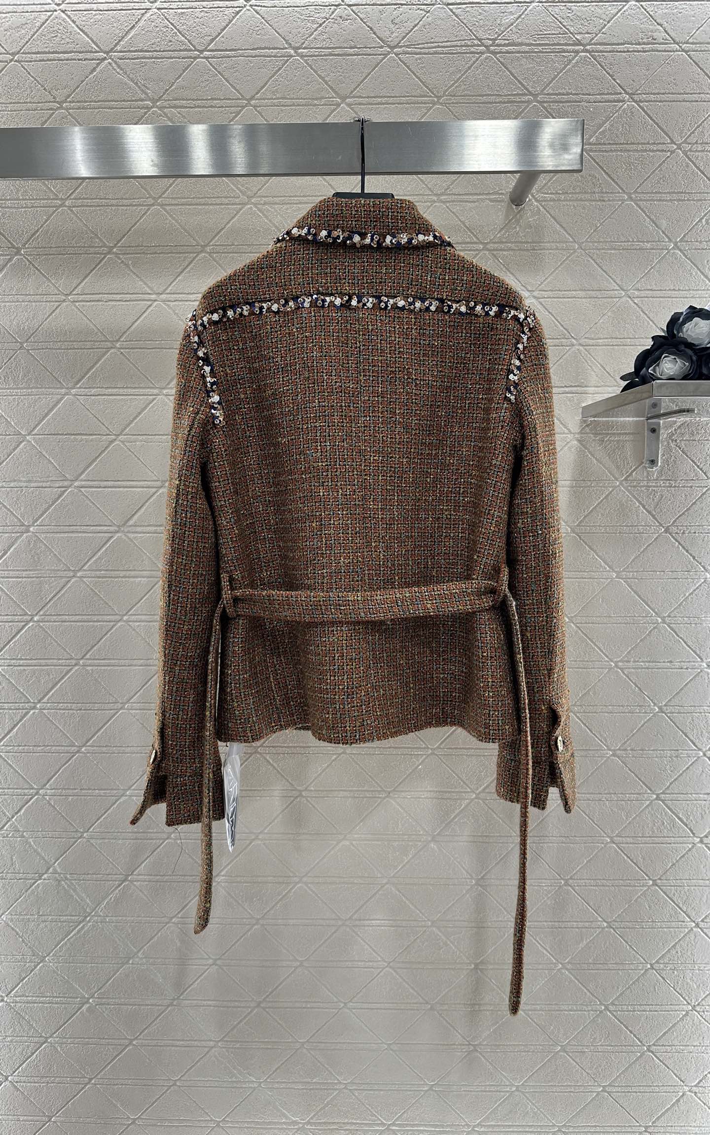 Lapel and belted dress jacket with beaded hem