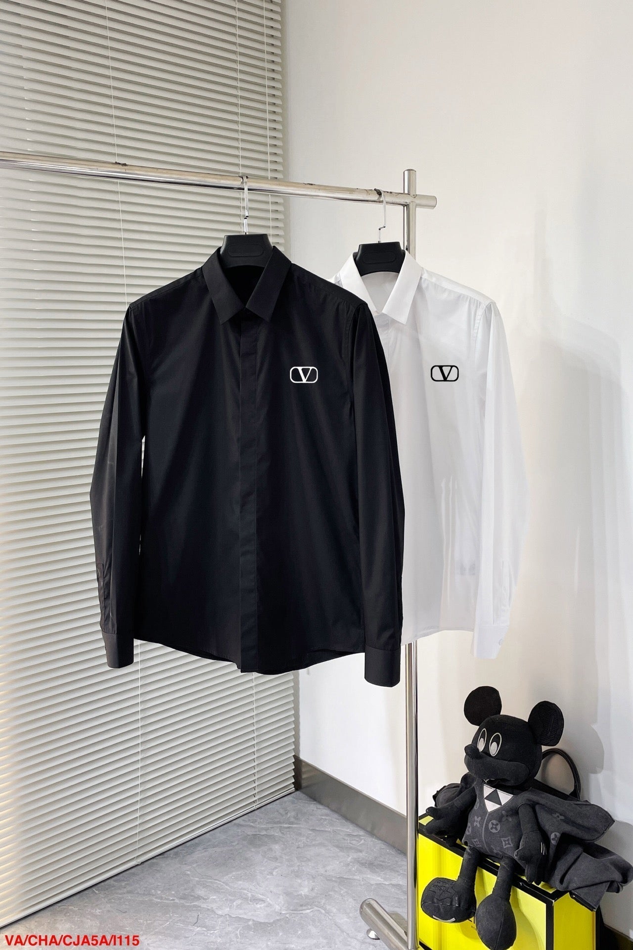 shirt with embroidered letters on chest