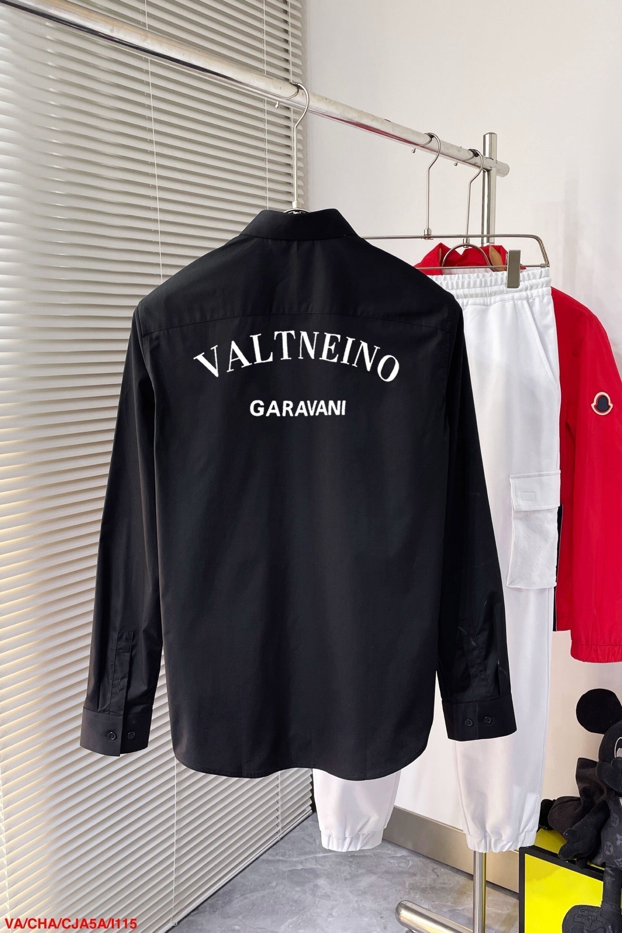 shirt with embroidered letters on chest