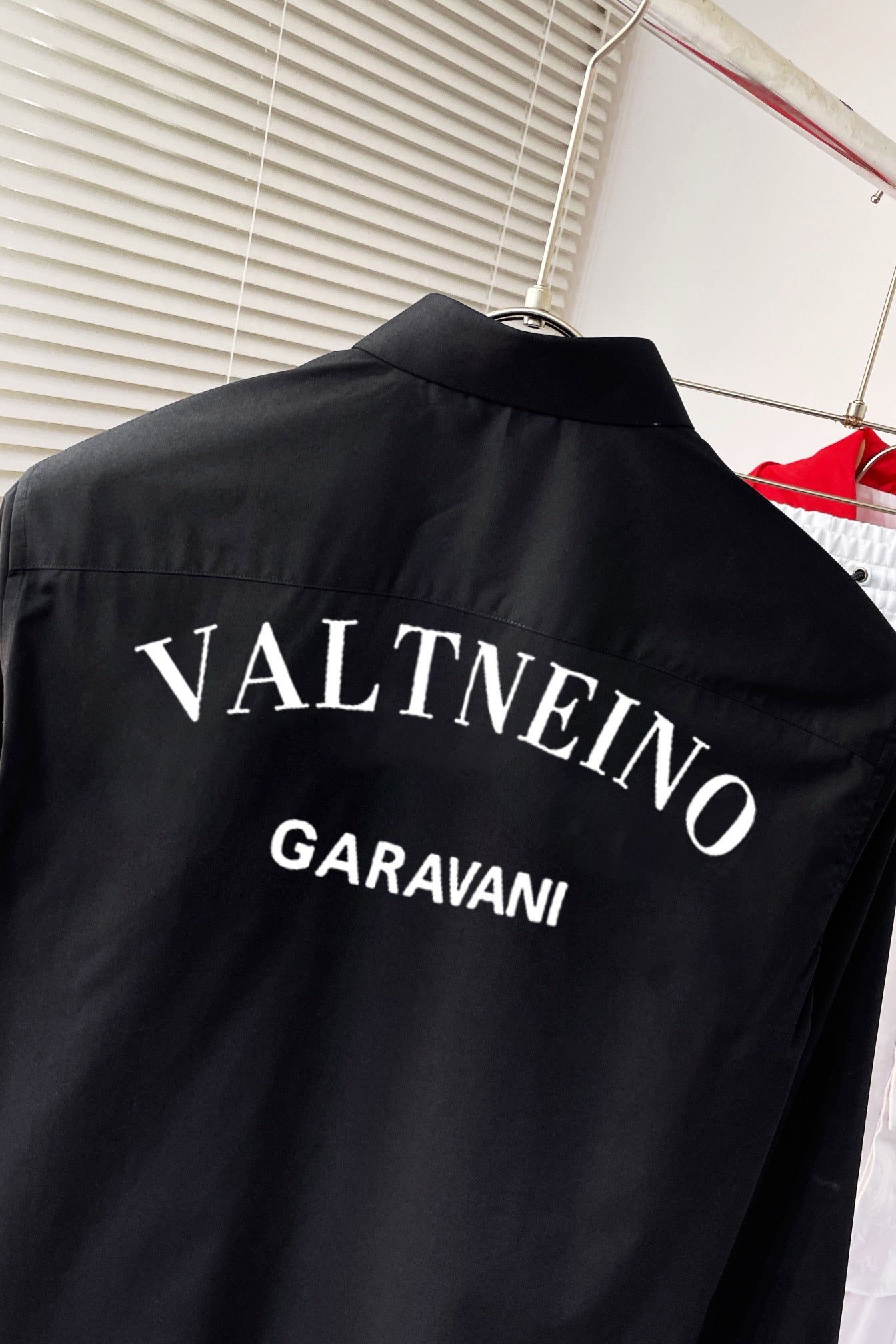 shirt with embroidered letters on chest