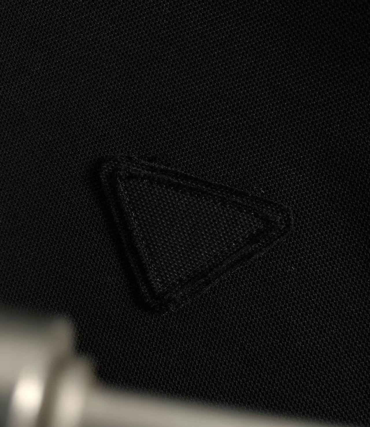 Classic black polo