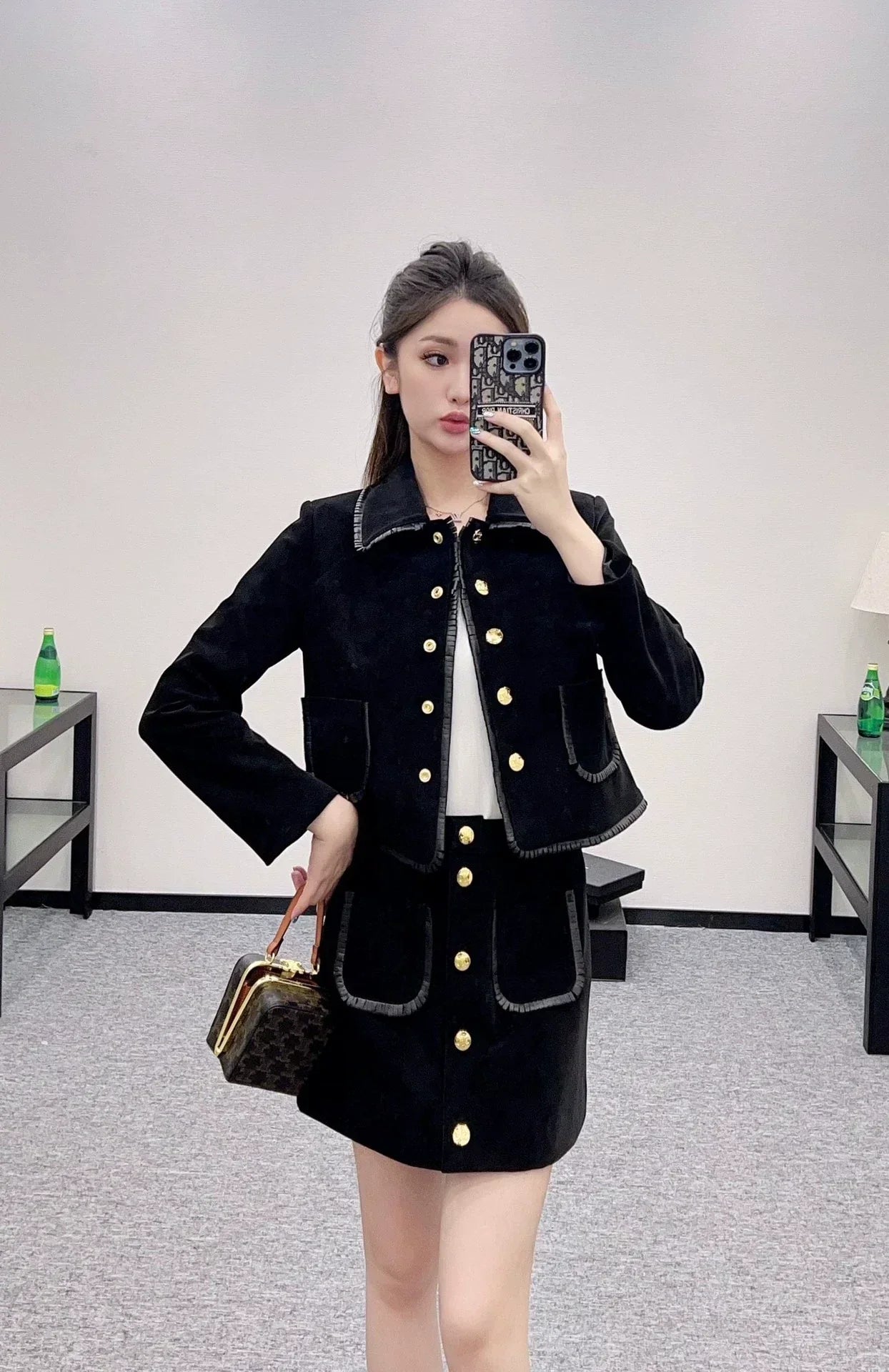 25 Genuine leather jacket and skirt set.