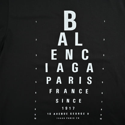 Eye chart knife cuts holes in short sleeves