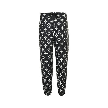 25fw distressed mottled monogram print trousers