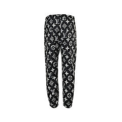 25fw distressed mottled monogram print trousers