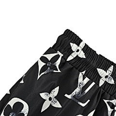 25fw distressed mottled monogram print trousers