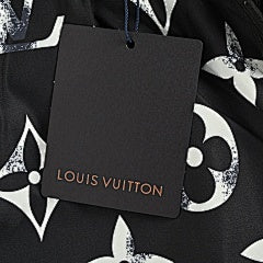 25fw distressed mottled monogram print trousers